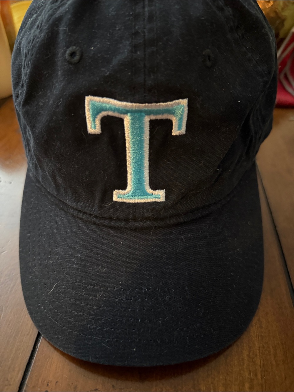 Black Baseball Cap with Turquoise 'T' Patch